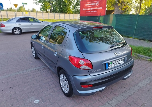 Peugeot 206 plus cena 11900 przebieg: 99875, rok produkcji 2009 z Szczecin małe 352